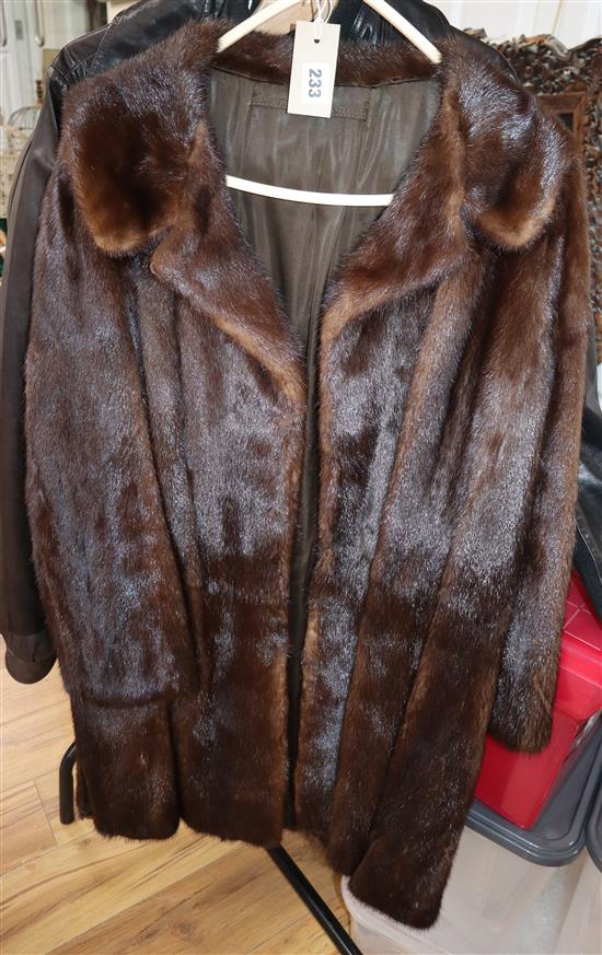 A three quarter length mink coat